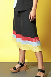 Khangura fashionable and trendy skirt in natural fiber. Beautiful black skirt with multi-color border. Find the boutique fashion at its best in this artful pull-on skirt by Khangura.