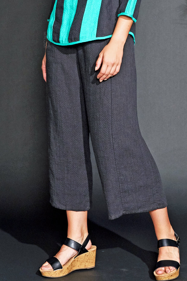 Khangura straight panel pants with pockets. Black linen capri pants perfect for the season. Comfy clothing USA made by Khangura Online Boutique.