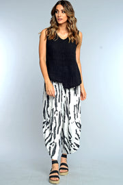 Khangura black and white funky pants. Unique wild print pants Easy pull-on, comfy pants made in USA by Khangura.  Online boutique for fun yet classy clothing for women. 