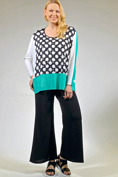 Artimino by Khangura designs stylish clothes for 70 year old woman. This beutiful tunic is modern yet classic for the middle-aged women. super comfy tunic top by Khangura clothing company is made in the USA. This casual knit top is one-size clothing for women. high-end, hip clothing by Khangura brand.